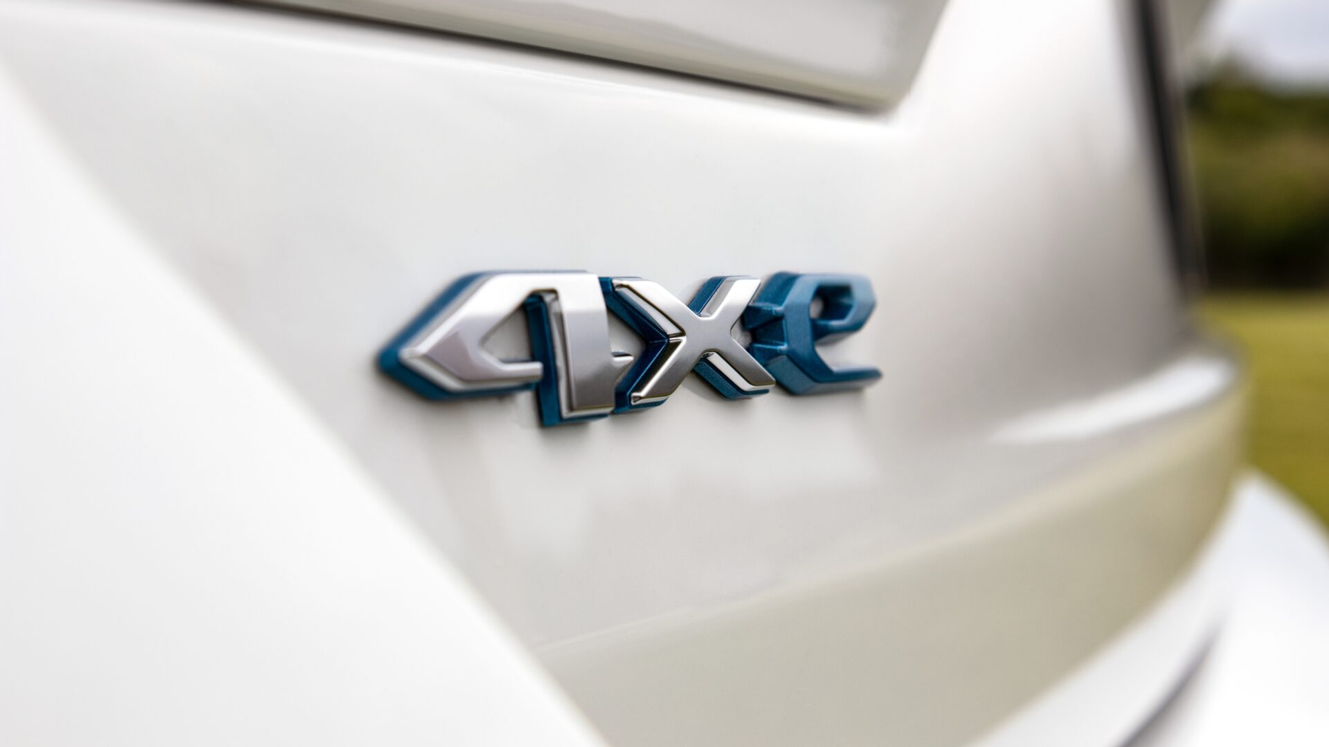 2024 Jeep Grand Cherokee Summit Reserve 4xe vue sur le logo 4xe de Jeep